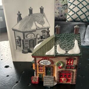 Department 56 North Pole Series - “Orly’s Bell & Harness Supply”